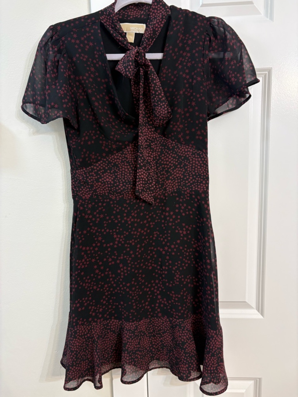 Michael Kors Black Dress with Burgundy Star Motif and Tie Neck